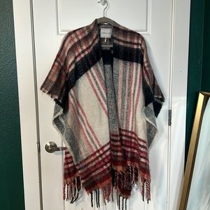 Plaid winter shall. Thick blanket like material. Keeps you toasty!